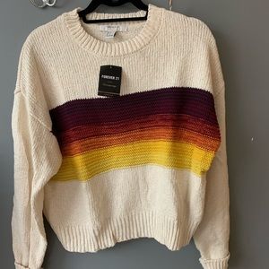 Colorful cable knit sweater.